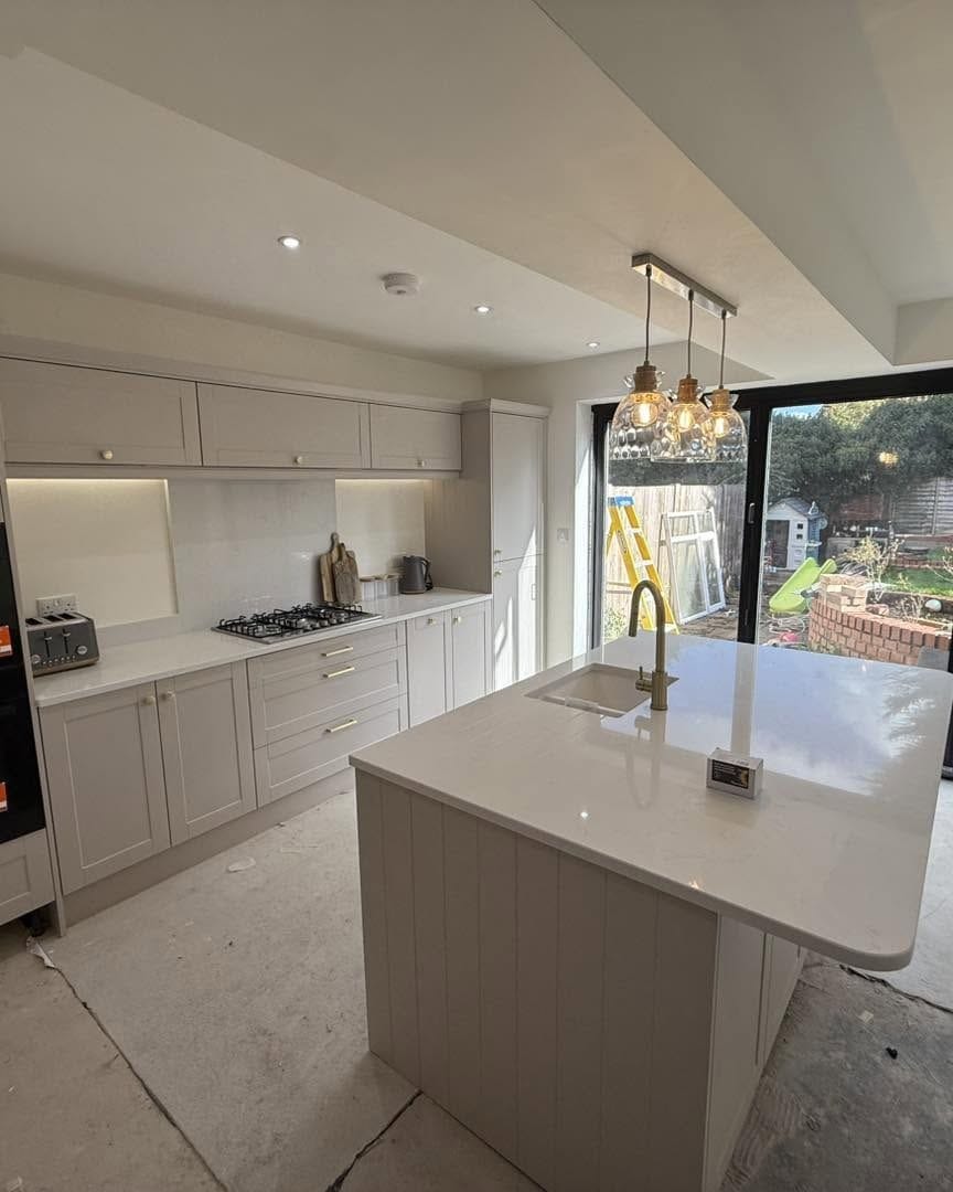 Kitchen island and units beside the bifold doors, Bewdley