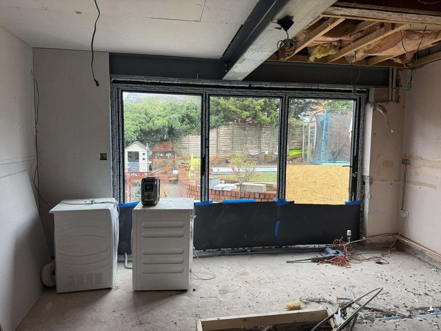 New bifold doors fitted below the steel, Bewdley