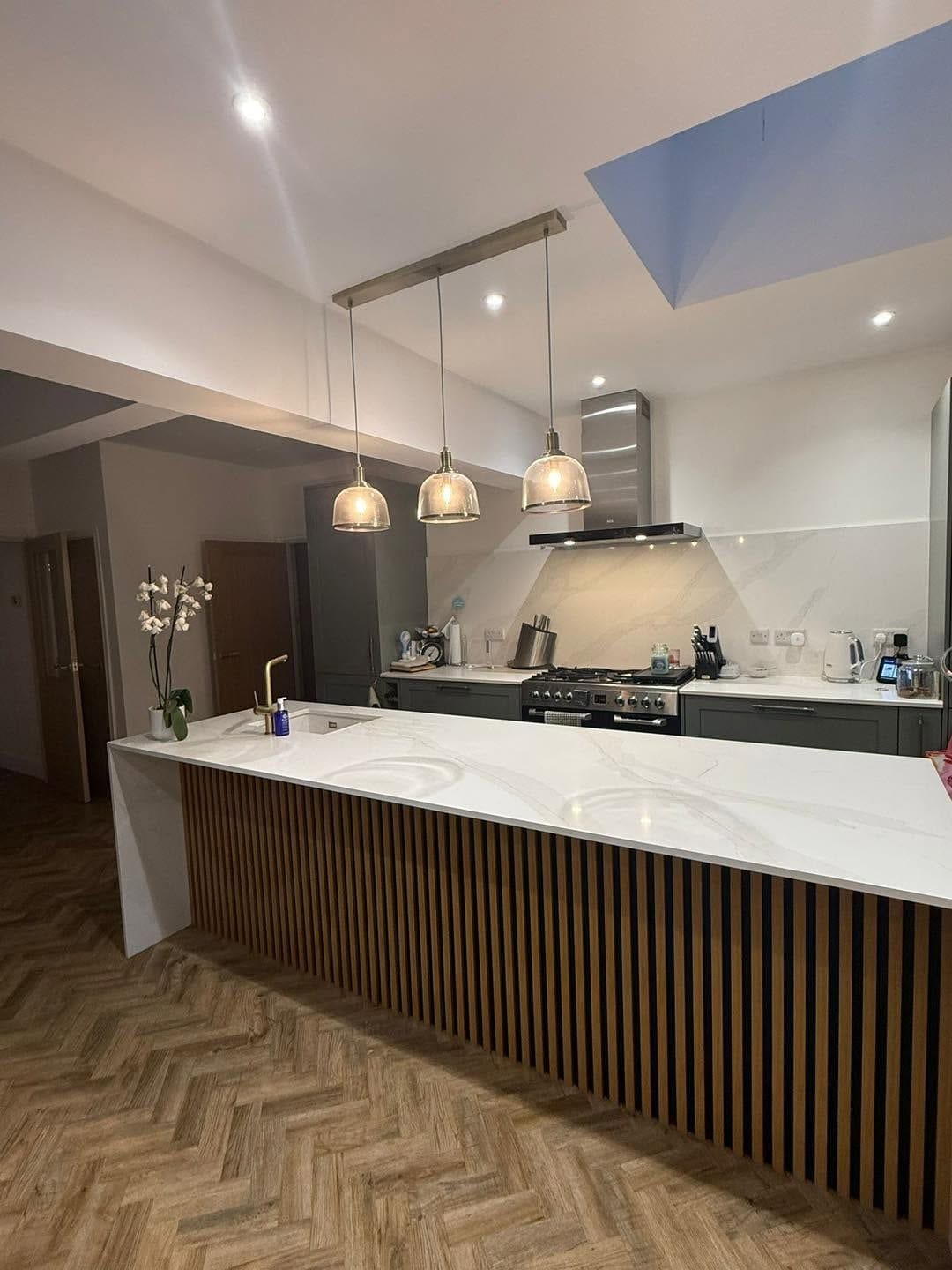 Kitchen island with fluted panel and pendant lights, Birmingham