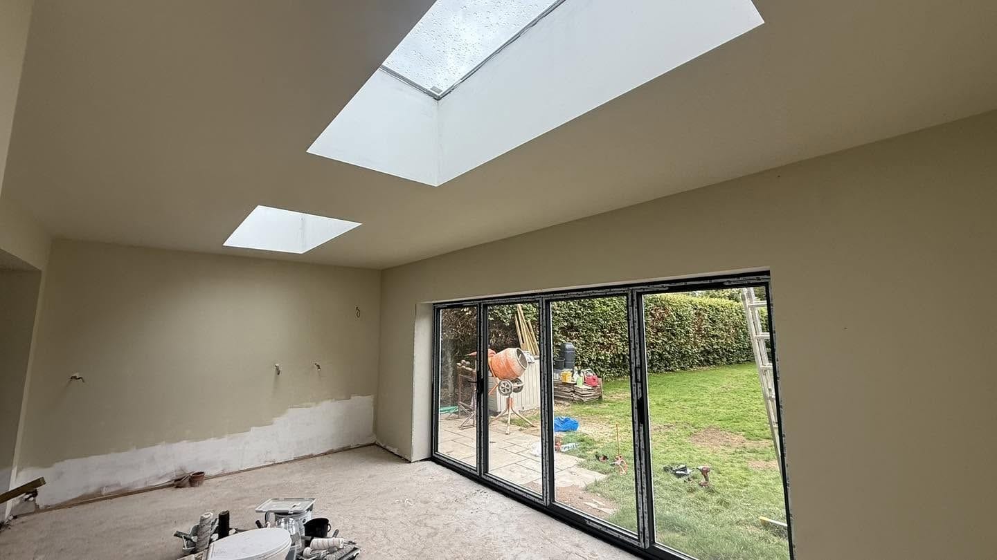Plastered extension with two roof lights and bifold doors, Bromsgrove