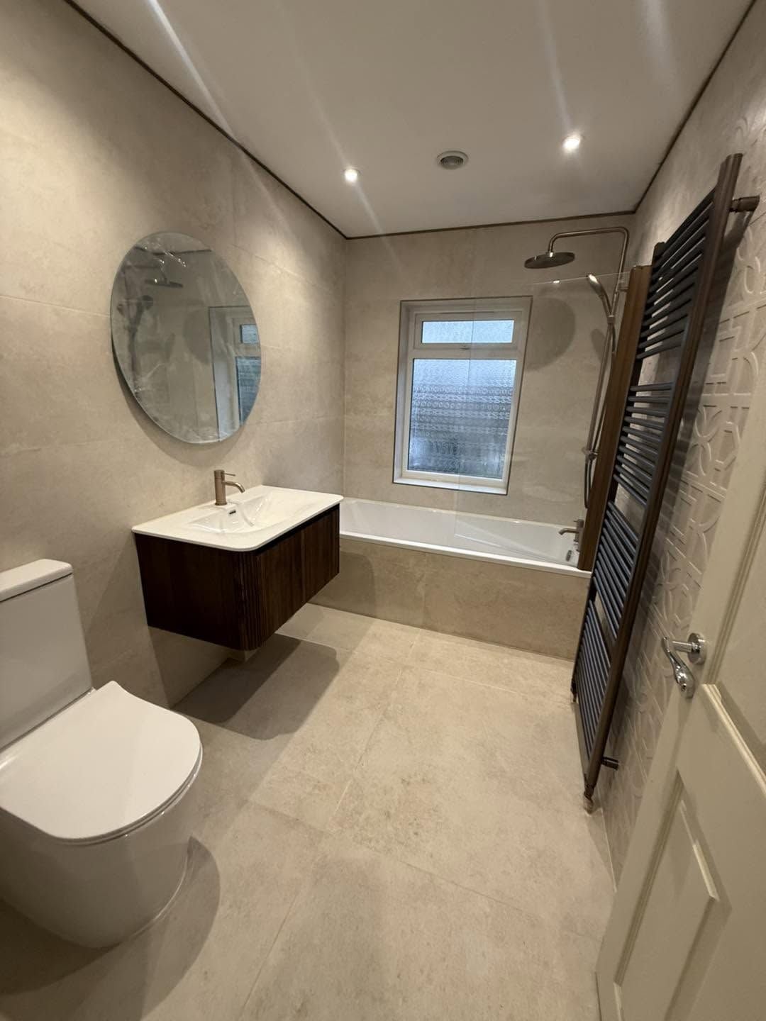 Finished bathroom with bronze fittings