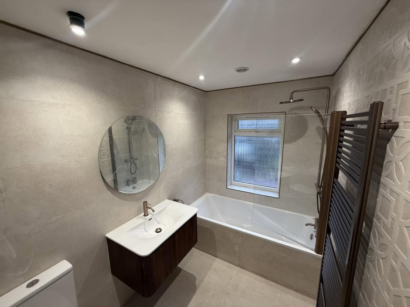 Finished bathroom, vanity and mirror