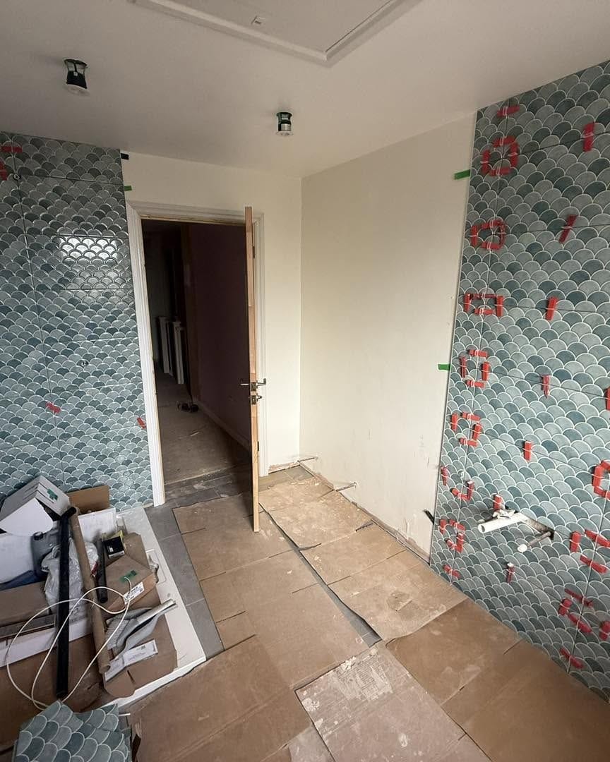 Bathroom tiling in progress, view to the doorway, Droitwich