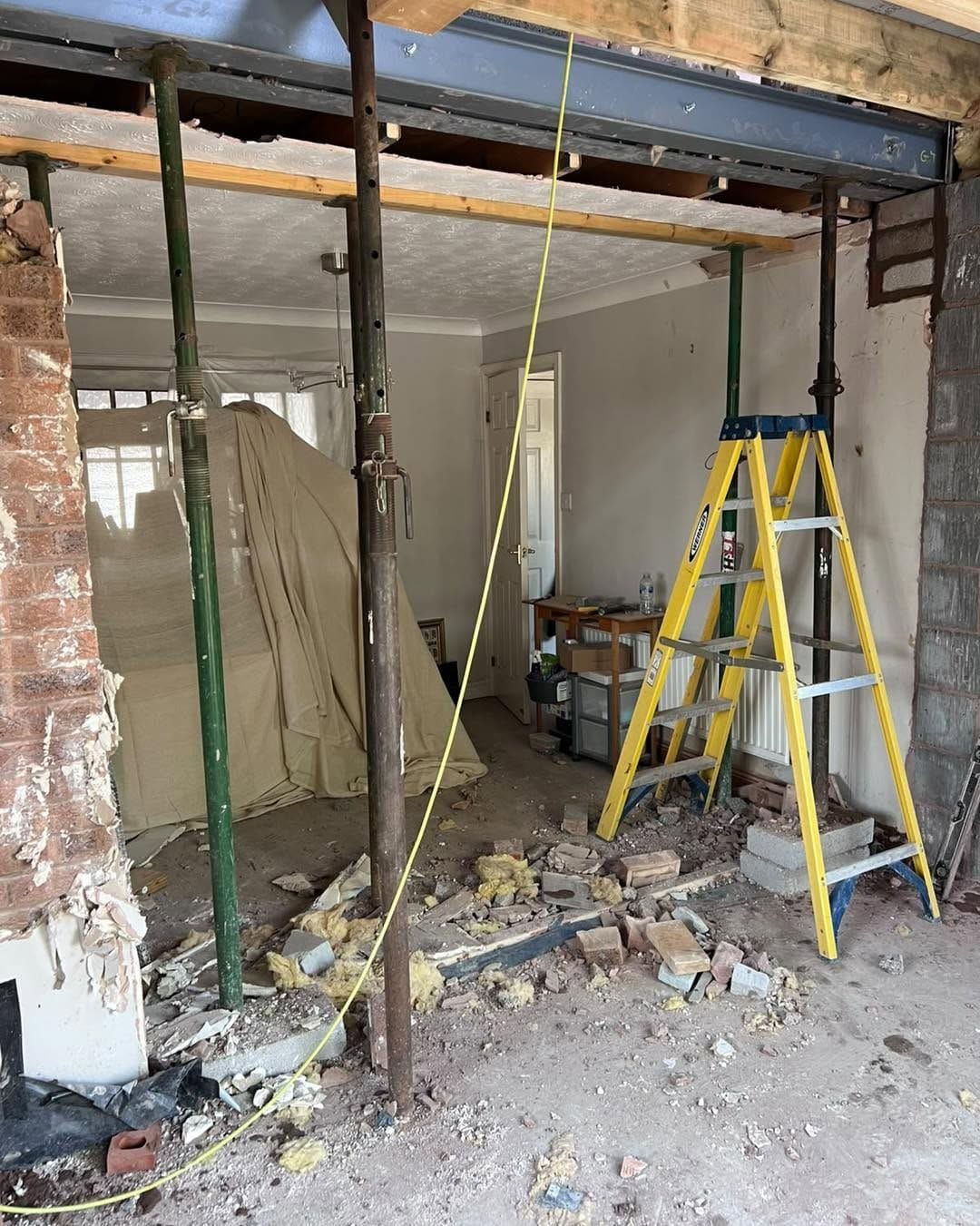 Structural steels propped inside during the knock-through, Droitwich