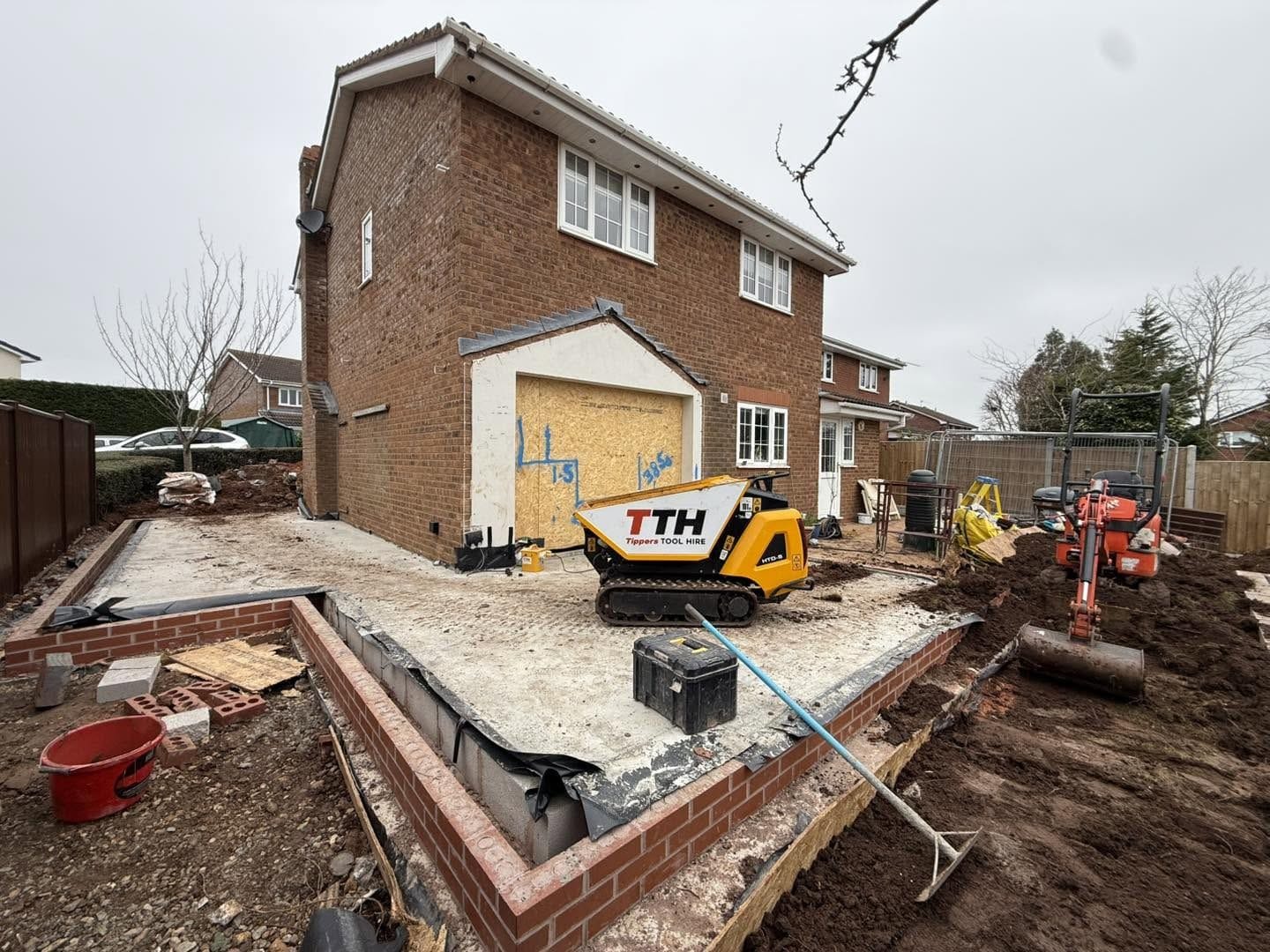 Extension brickwork at DPC with the oversite slab poured, Droitwich