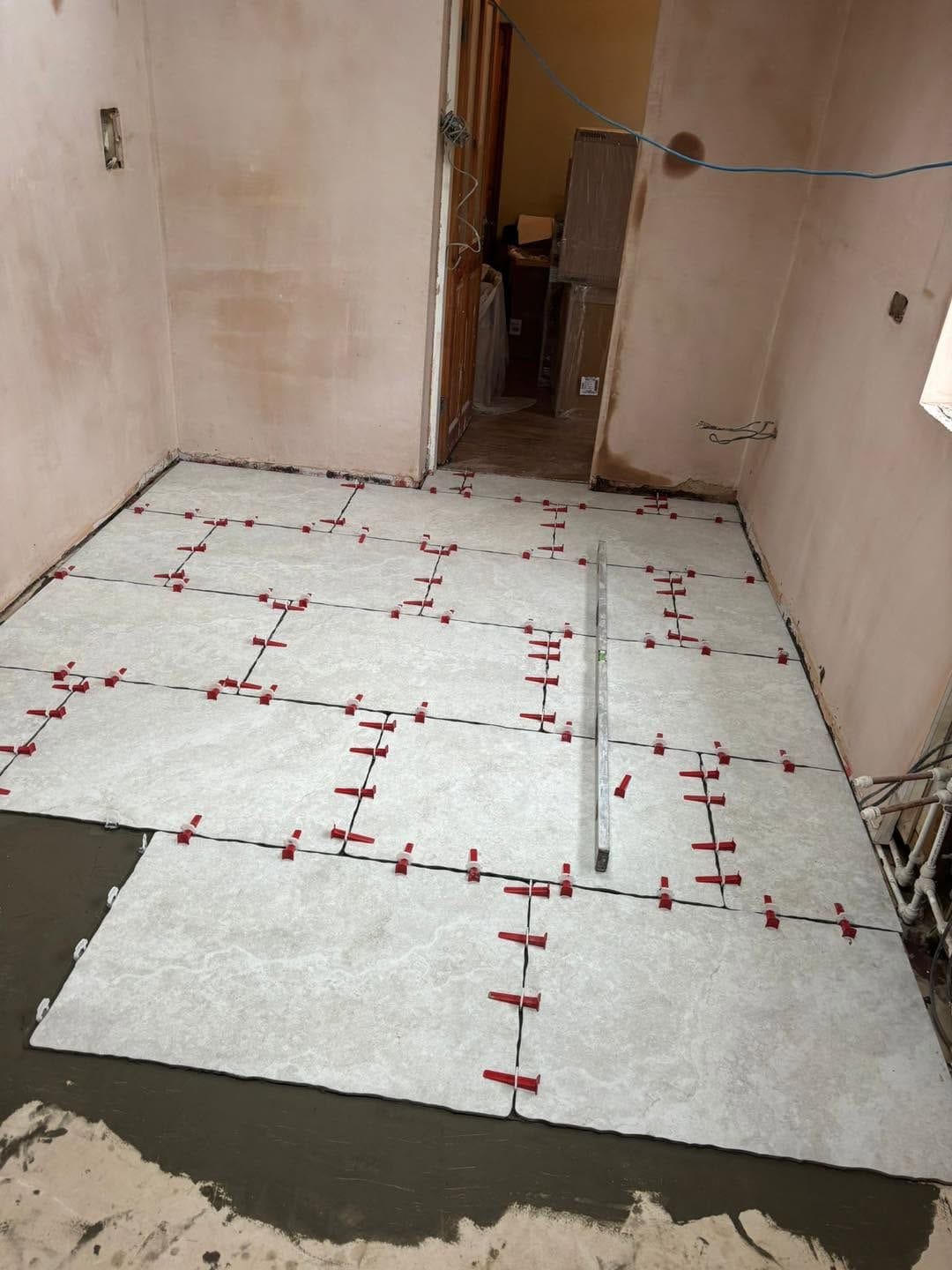 Floor tiles being laid, Kidderminster