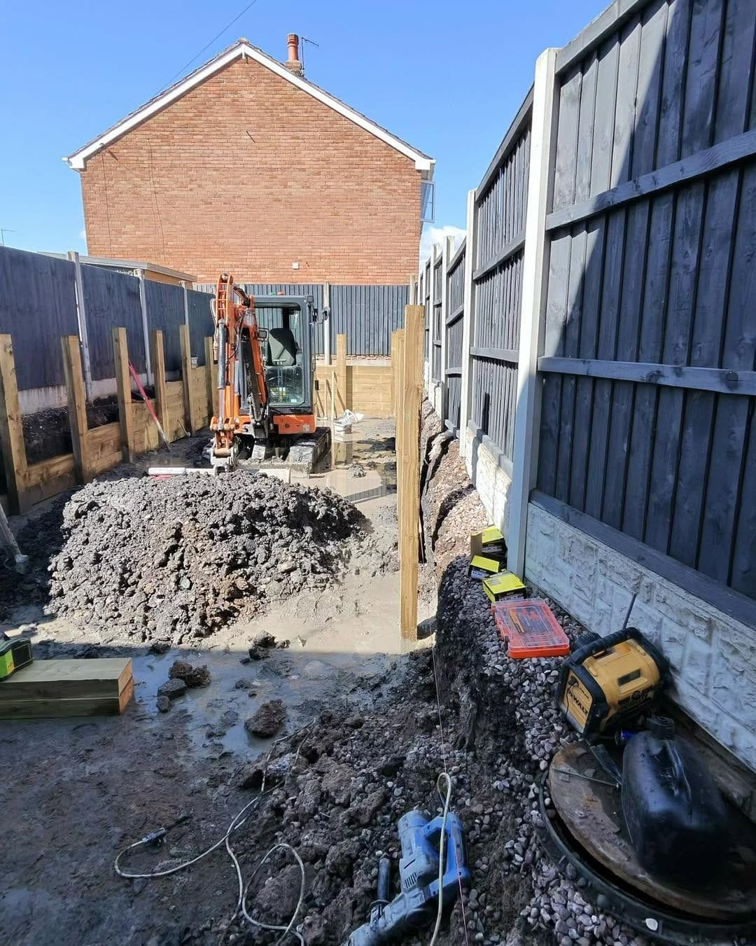 Sleeper retaining walls going in