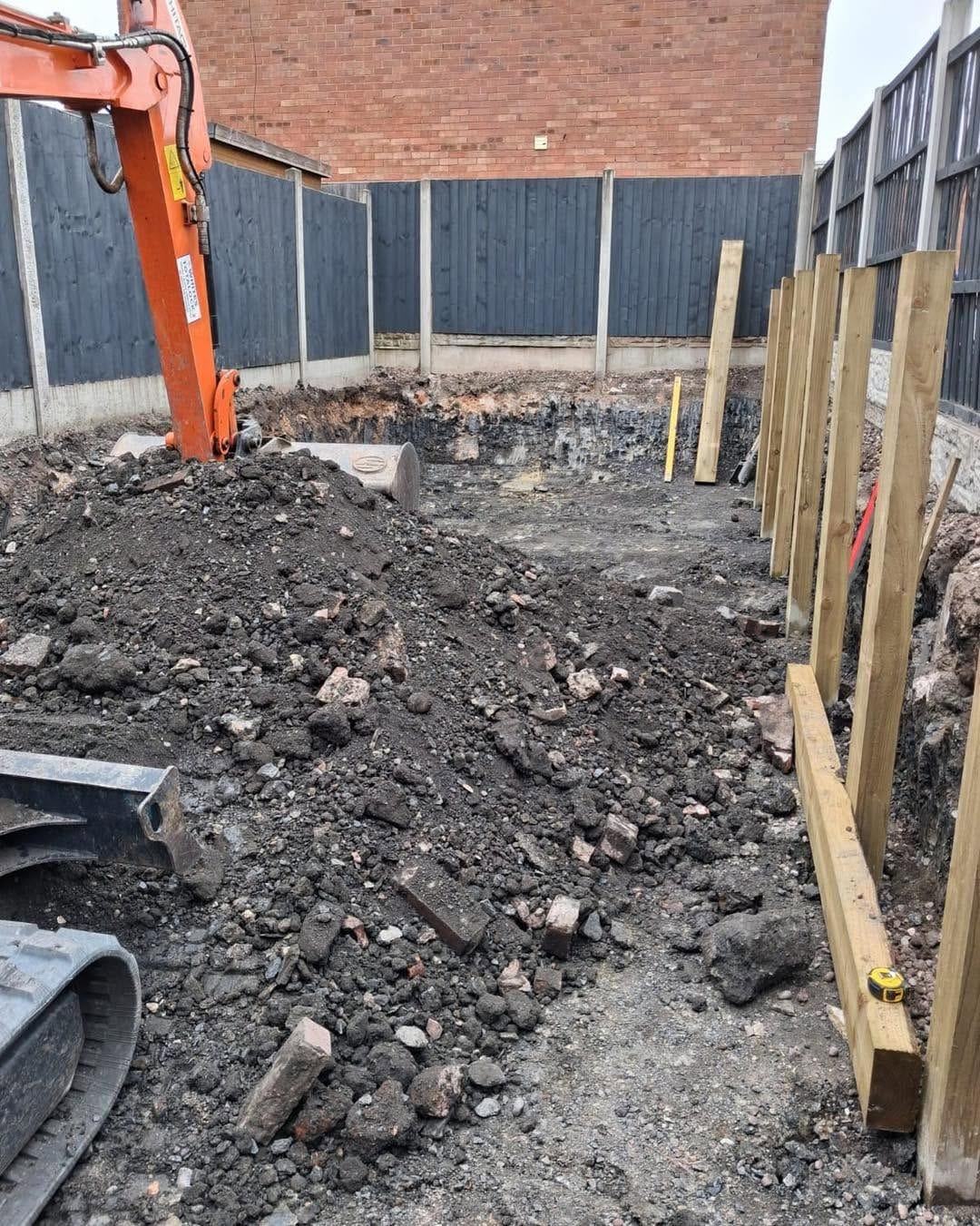 Material being moved and levelled