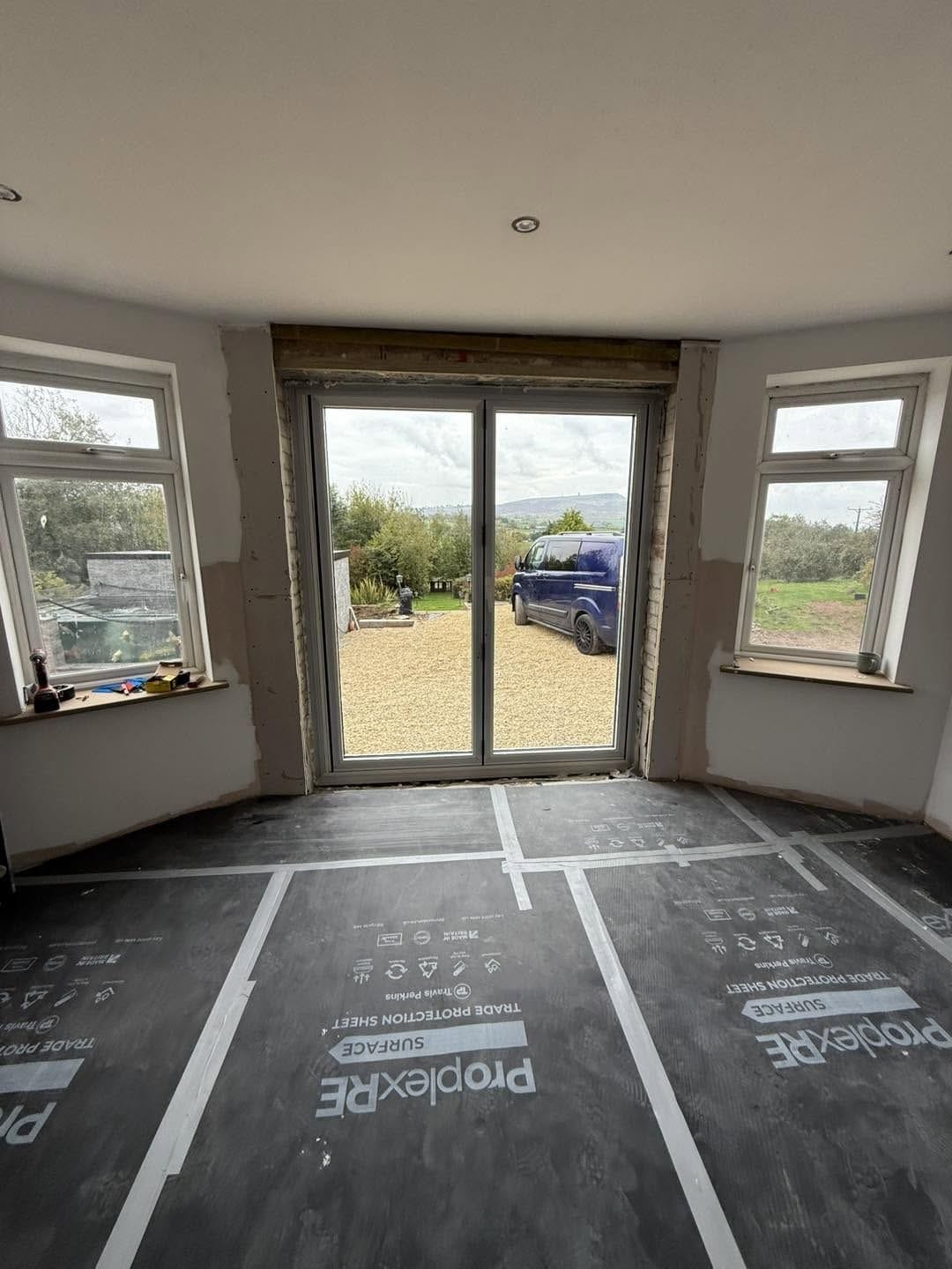 Sun room inside with new patio doors, Ludlow