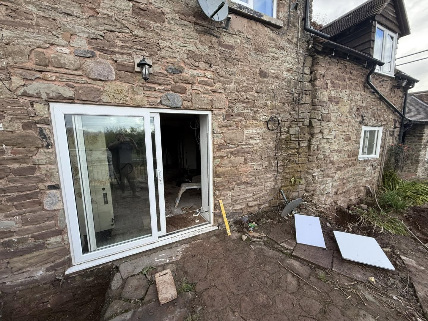 Rear stone wall with sliding doors, Ludlow
