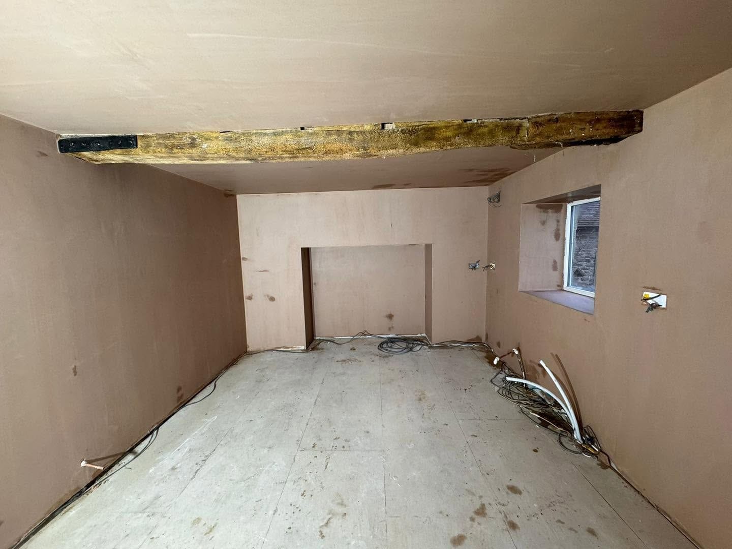 Plastered room with the original oak beam kept, Ludlow