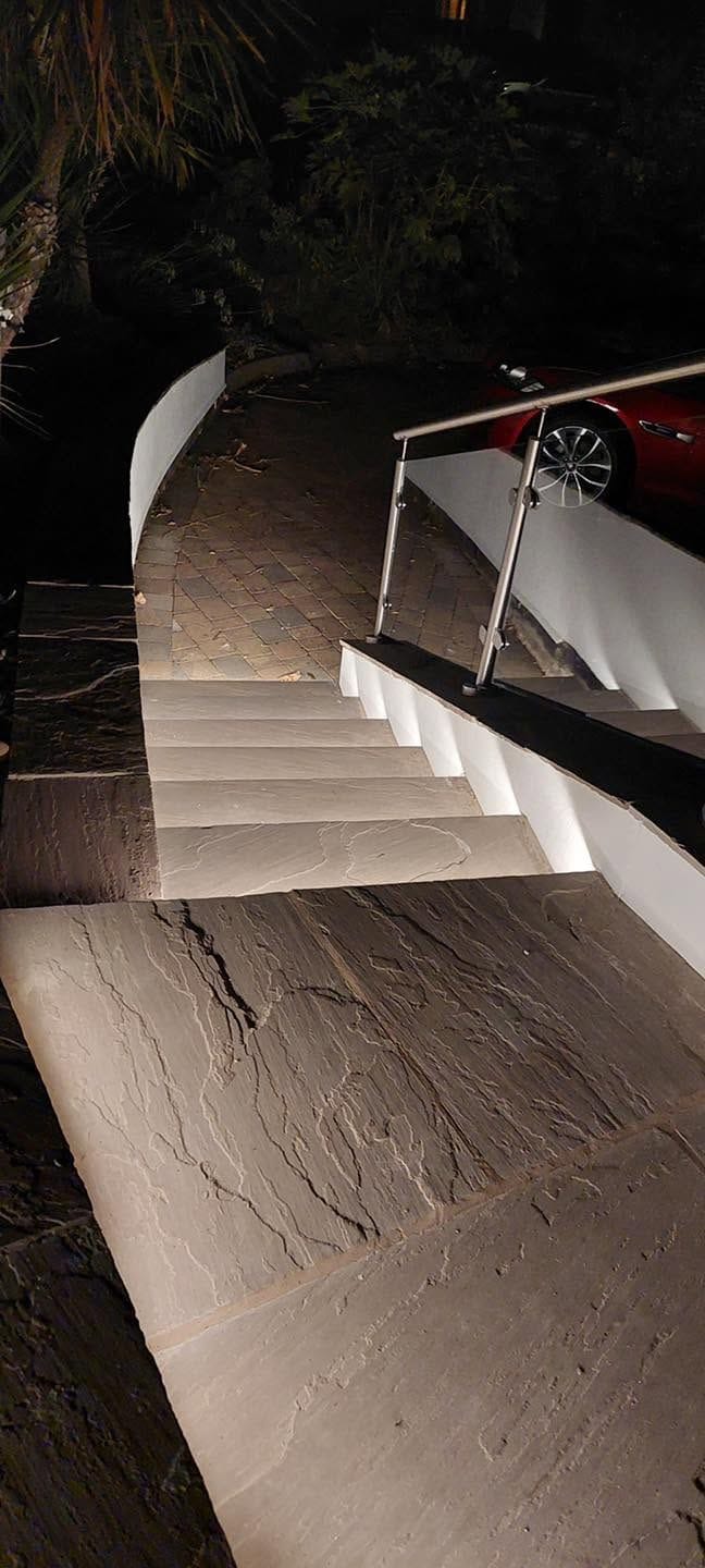 Steps from the top at night